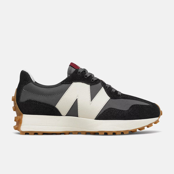 New Balance Sneakers donna nera N asimmetrica bianca